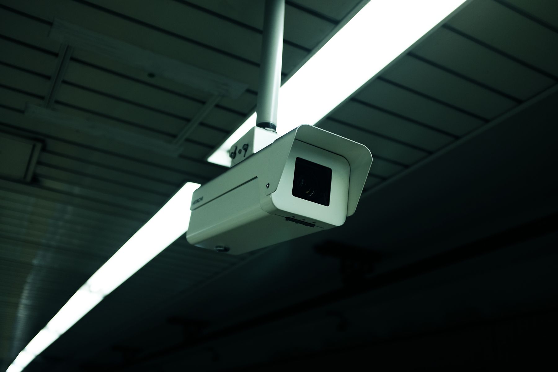 A standard ceiling camera in a retail store